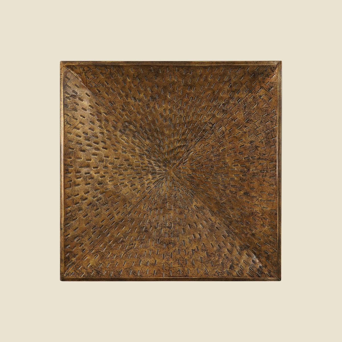 A square decorative wall plaque featuring a textured, woven radial pattern in earthy brown and bronze tones, centered on a solid light beige background.