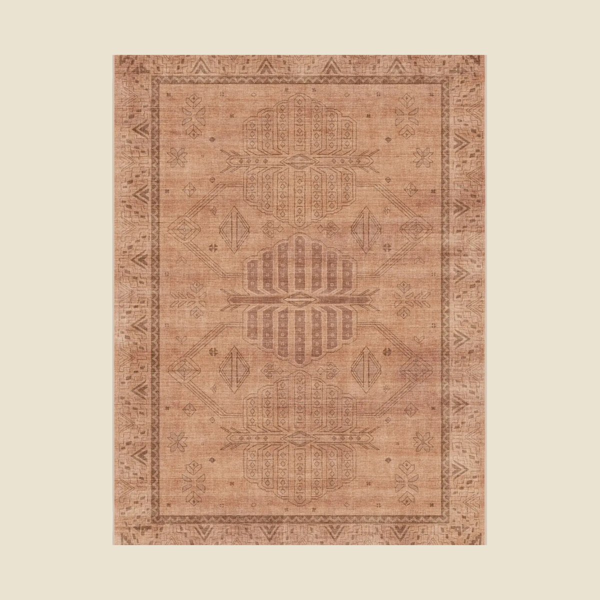 A rectangular area rug with a distressed, vintage-style bohemian pattern in warm tan, beige, and brown tones, centered on a solid cream background.