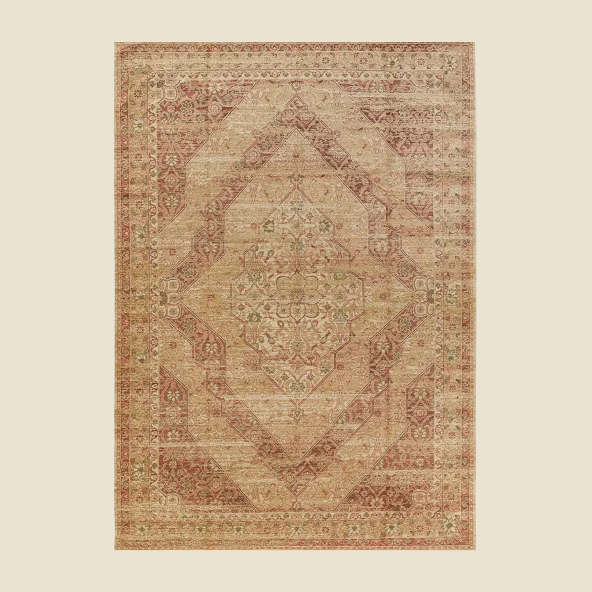 A rectangular vintage-style area rug with an intricate geometric and floral medallion pattern in muted beige, terracotta, and dusty rose tones, shown flat against a solid light beige background.