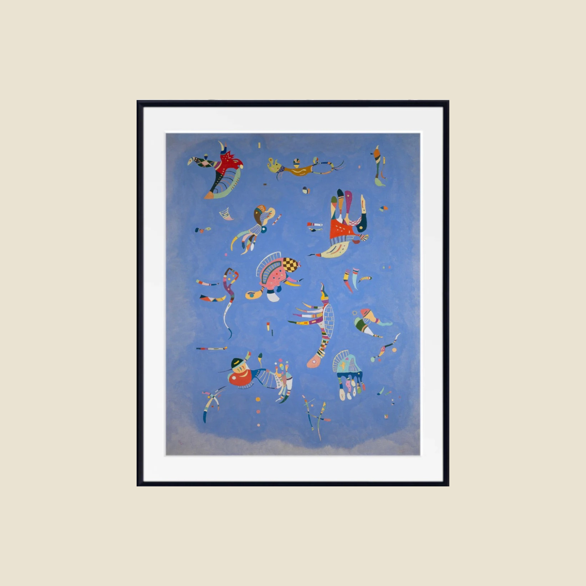 A framed art print featuring a whimsical, colorful illustration of kites against a light blue sky, presented on a warm beige background.